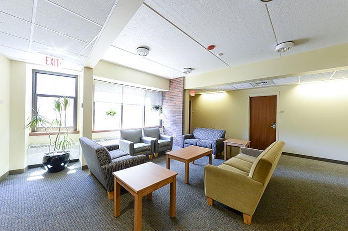 Stever House Community Lounge - couches and chairs coffee tables and windows